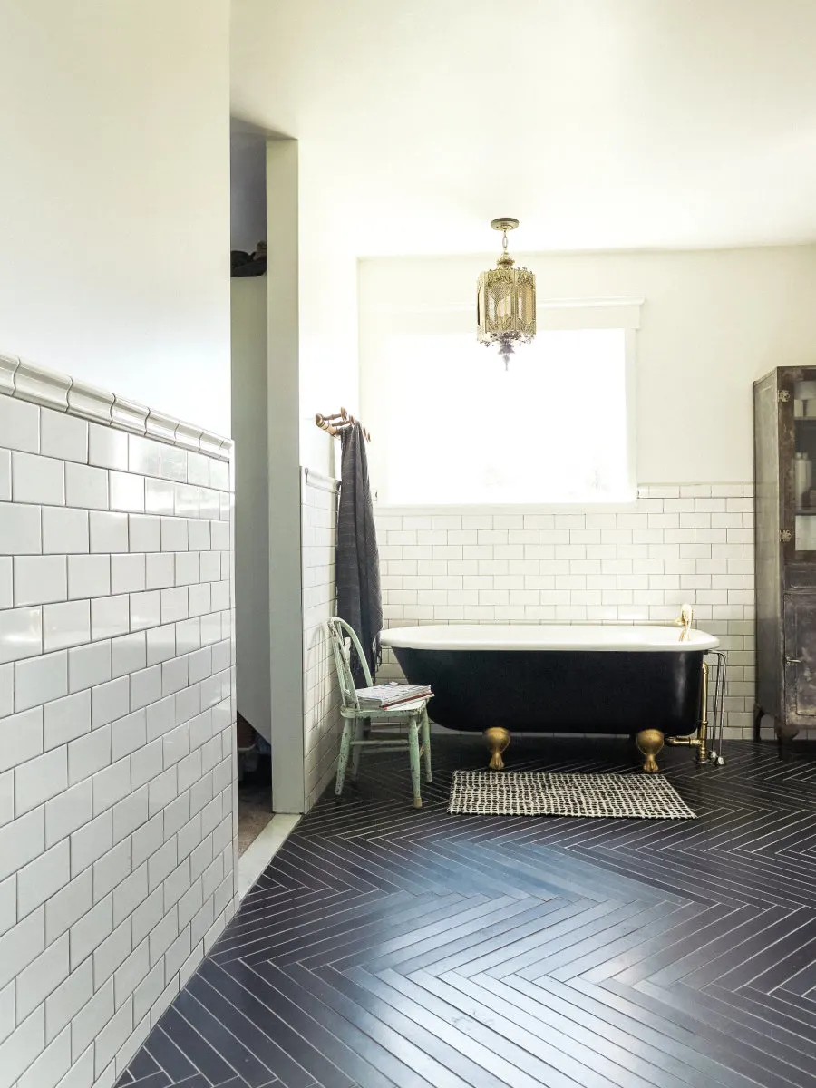 Bathroom with Black Herringbone Tile1